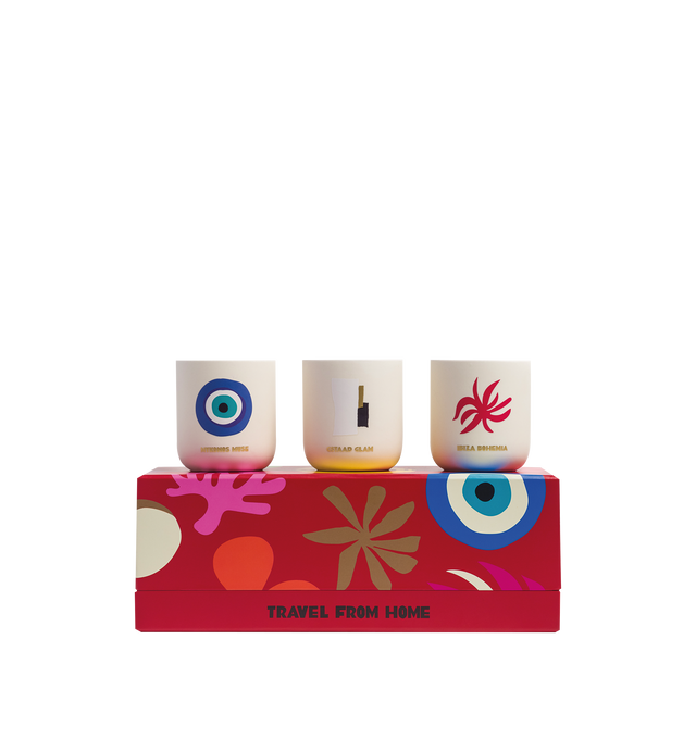Image 2 of 3 - RED - Assouline Travel From Home Mini Scented Candle Set is a luxury fragrance gift set featuring three travel-inspired mini candles that capture the signature scents of Mykonos Muse, Ibiza Bohemia, and Gstaad Glam. Crafted by renowned perfumer Jrme Epinette and presented in an elegant gift box, each candle is housed in a refined vessel, offering an inviting way to experience Assouline's celebrated Travel From Home collection. Fragrances: Mykonos Muse, Ibiza Bohemia, Gstaad Glam. Materials: C 