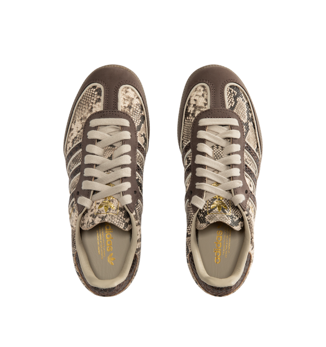 Image 5 of 5 - BROWN - Adidas Mens Snake-Effect Sneakers are crafted from calf leather. Features a snake-effect finish, round toe, lace-up closure, signature 3-Stripes, logo-print tongue, branded heel counter, and flat rubber sole. Upper: Calf Leather; Lining: Calf Leather; Sole: Rubber. Made in Vietnam. 