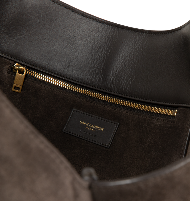Image 3 of 3 - BROWN - SAINT LAURENT Le 5  7 Bea Suede Bag featuring supple tote in suede, lightweight and fully lined in tonal suede, inner zip pocket, leather tab closure decorated with the cassandre, east/west format and inner ties allow the sides to be collapsed or expanded to create different silhouettes. 19.7" x 11" x 7.1". Calfskin. Made in Italy. 
