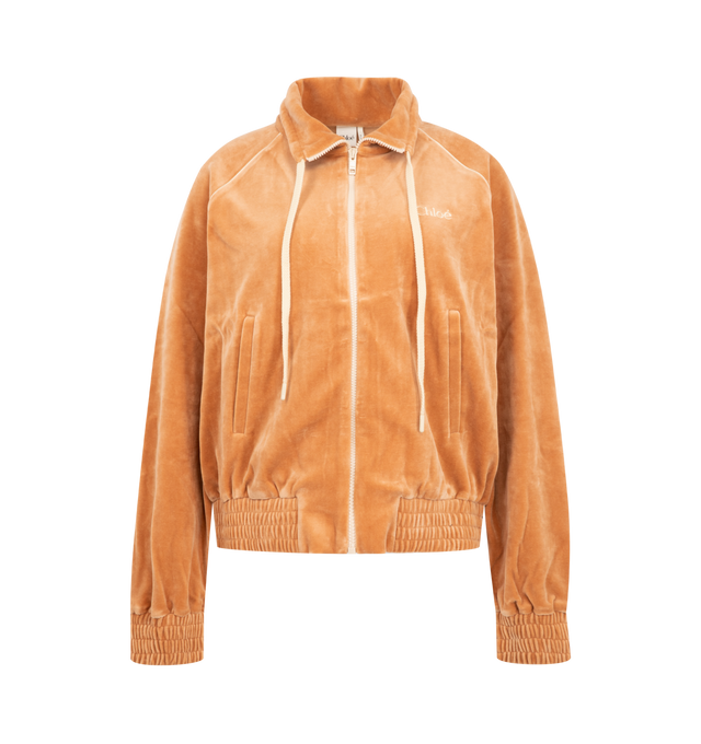 Image 1 of 3 - ORANGE - Chlo Womens Tracksuit Jacket is crafted from velvet jersey. Features a casual fit, high neckline with adjustable drawstring, front zip closure, long sleeves, elasticized cuffs and hem, side pockets, contrast piping, and embroidered logo at the chest. Main Material: 80% Cotton, 20% Polyamide. Made in Portugal. 