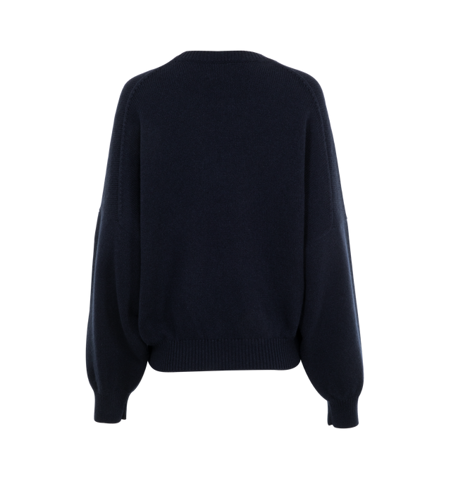 Image 2 of 3 - NAVY - Khaite luscious crewneck pullover in densely knit cashmere selected for its fluid quality. Relaxed by dropped shoulder seams. Refined by ribbed trim. Dense cashmere (100% cashmere). 