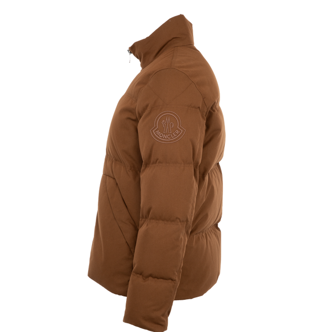 Image 3 of 3 - BROWN - Moncler Bayamo Jacket is designed in cotton and nylon canvas with a zipper closure, zipped inner pockets, elastic drawstring hem, adjustable cuffs, pockets with snap button closures, and an embroidered logo. 59% cotton, 41% polyamide/nylon. Made in Italy.  