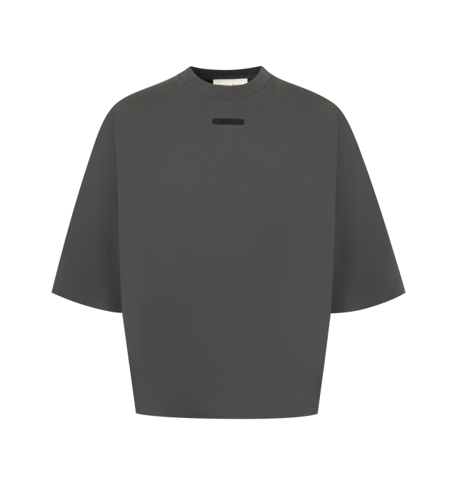 Image 1 of 2 - GREY - The Fear Of God Men's Merch Tee is crafted from 100% cotton jersey and designed in a boxy, relaxed fit with dropped shoulders and 3/4-length sleeves. Details include a rib-knit collar and Essentials signature label at the center front.  
