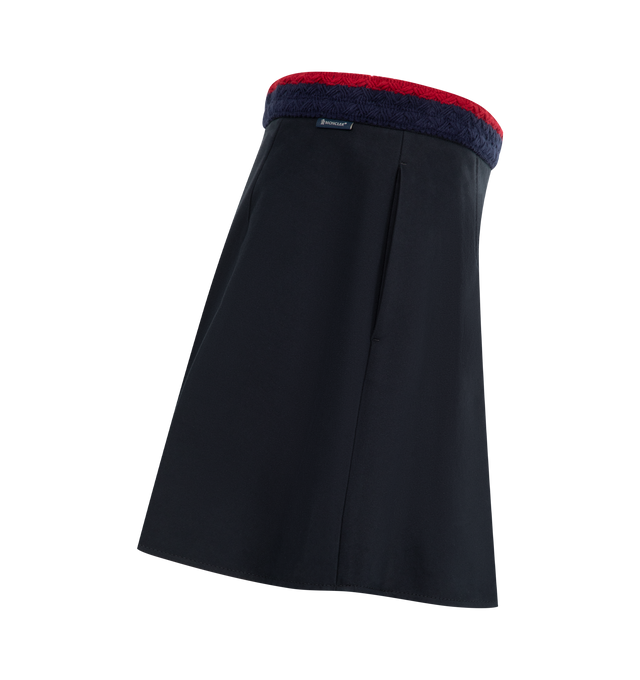 Image 3 of 4 - NAVY - MONCLER Pleated Mini Skirt featuring stretch cotton gabardine, striped braided waistband, side zipper closure and pleated. 98% cotton, 2% elastane/spandex. 