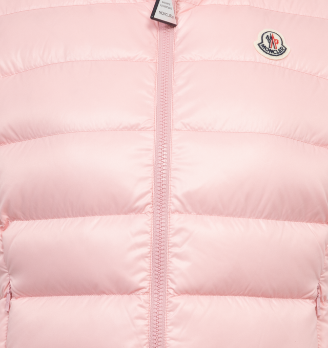 Image 3 of 3 - PINK - MONCLER Ghany Puffer Vest featuring nylon laqu, nylon laqu lining, down-filled and boudin-quilted, zipper closure and side seam pocket with concealed zipper closure. 100% polyamide/nylon. Padding: 90% down, 10% feather. 