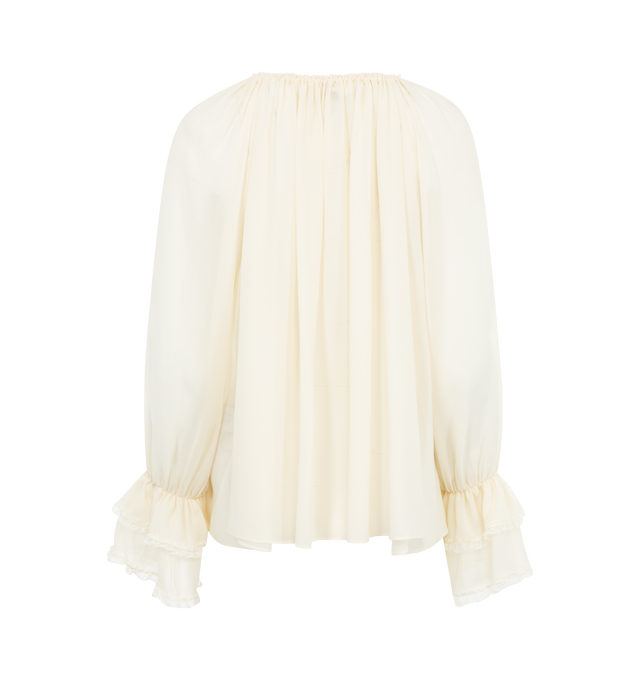 Image 2 of 2 - WHITE - CHLOE Gathered V-Neck Top featuring organic silk georgette with a V-neckline, drawstring collar with hammered metal ends and flared and lace-trimmed cuffs. 100% silk. Braid: 90% cotton, 10% polyamide.  