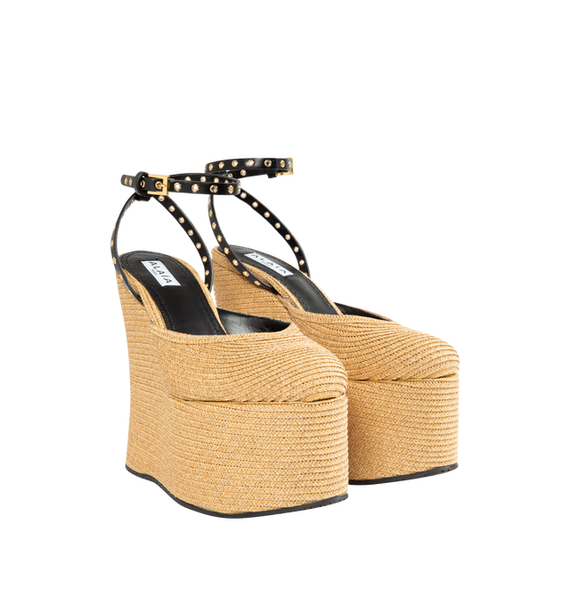 Image 2 of 4 - NEUTRAL - ALAIA Wedge Sandals featuring leather eyelet-detailed straps, chunky platform sole and buckle fastening. Heel height measures 150mm. Platform measures 75mm. Raffia, leather. 