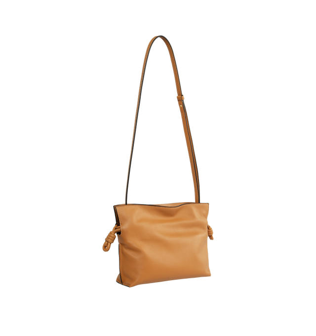 Image 2 of 4 - BROWN - LOEWE Flamenco Mini Napa Drawstring Clutch Bag featuring suede lining, coiled knot drawstring and hidden magnetic closure. 7"H x 9.4"W x 3.5"D. Convertible shoulder strap: 11 1/2" 23 1/2" drop. Nappa calf. Made in Spain. 