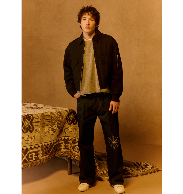 Image 2 of 4 - NAVY - SECOND LAYER Angel Pants featuring a straight-leg silhouette embroidered with a metallic web design on the left thigh, side welt pockets, back patch pockets, zip fly and button closure. 100% polyester.  