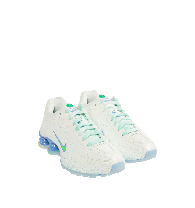 Image 2 of 5 - WHITE - NIKE Shox R4 Sneaker featuring Nike Shox columns provide responsive cushioning, modified, circular waffle outsole, laser perforations throughout, lace up closure and padded collar.  