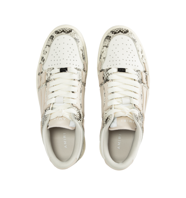 Image 5 of 5 - WHITE - AMIRI Skel Snake-Embossed Low-Top Sneakers featuring matte and snake-embossed leather, flat heel, round toe, lace-up vamp, logo on the tongue and heel, padded collar, skeleton motif on the side and rubber outsole.  