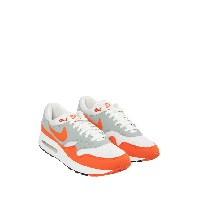 Image 2 of 5 - ORANGE - Nike Air Max 1 86' Premium Sneakers are a lace-up style with a padded low-cut collar, visible Nike Air cushioning, and rubber waffle outsoles.  