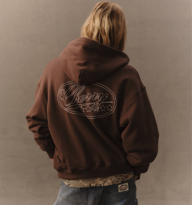 Image 6 of 6 - BROWN - Cherry LA Men's 5 Star Thermal Zip Hoodie is crafted from custom cotton fleece and features a boxy-fit silhouette, a full-zip front closure, and a custom poly-cotton thermal lining for added warmth and comfort. Designed with embroidery at the back, a nickel zipper, and a branded label at the cuff, this elevated everyday layer combines utility-inspired details with Cherry LA's signature aesthetic. Main Material: Custom Cotton Fleece. Lining: Custom Poly-Cotton Thermal. Made in Los Ange 