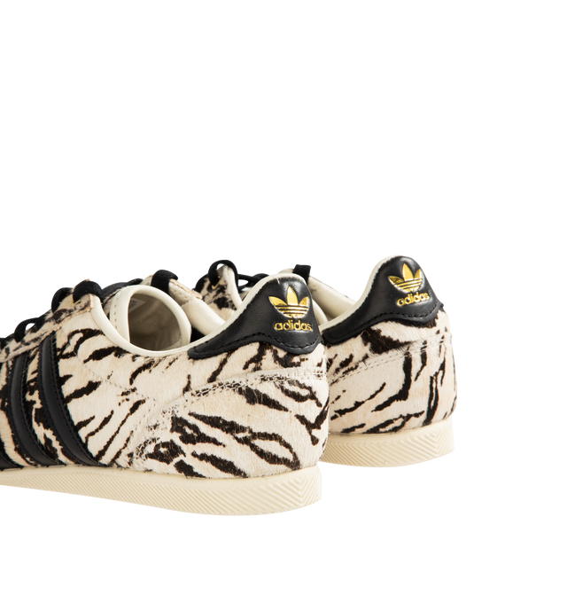 Image 3 of 5 - WHITE - ADIDAS Japan Zebra Pony Hair Sneaker featuring double-stitched T-toe, pony hair finish, iconic 3-Stripes branding, lateral box logo, regular fit, laces, leather upper, textile sockliner and rubber outsole. 