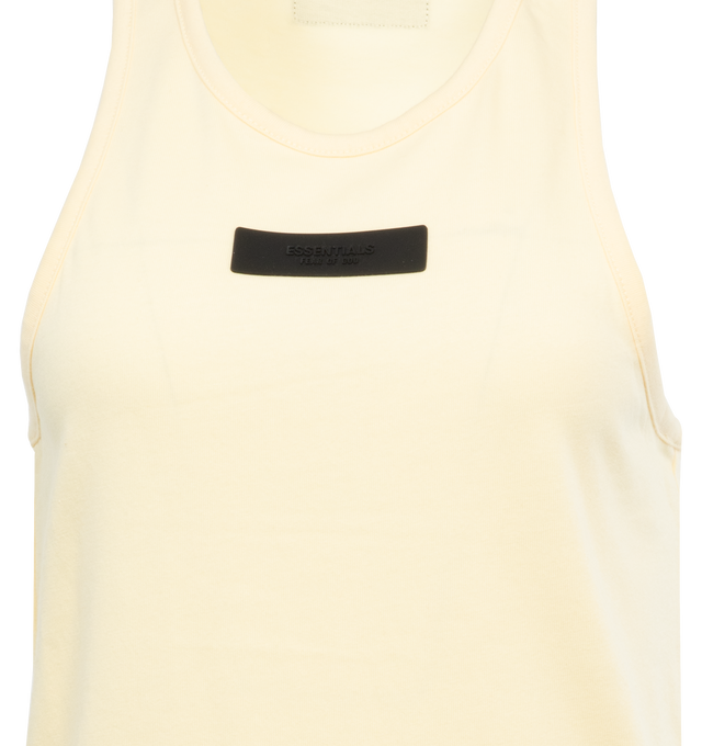 YELLOW - FEAR OF GOD ESSENTIALS Tank Top featuring U-neck, relaxed fit, dropped arm holes, rubberized logo bar on the center front and rubberized label is at the back collar. 53% cotton, 40% polyester, 7% rayon. 