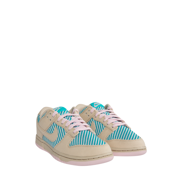 Image 2 of 5 - MULTI - Nike Dunk Low Sneakers with Sand Drift and Dusty Cactus color-blocking, signature swoosh,  a padded, low-cut collar, leather upper with a slight sheen and durability, foam midsole offering lightweight, responsive cushioning. Perforations on the toe add breathability. Rubber sole with classic hoops pivot circle provides durability and traction. 