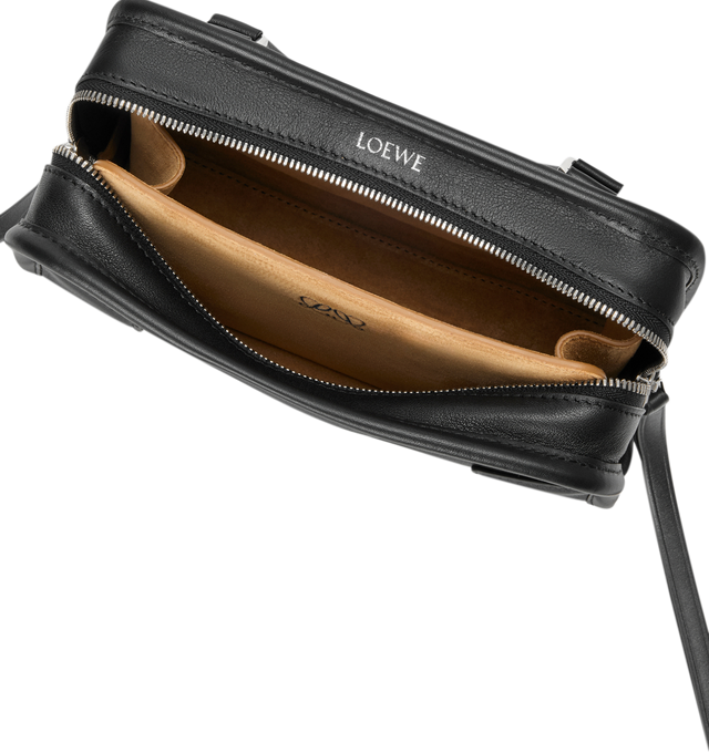 Image 8 of 11 - BLACK - Loewe Mini Amazona 180 Bag in leather features a relaxed silhouette anchored by a single toron top handle, designed to be carried open, while a concealed closure secures the main compartment, removable shoulder and crossbody straps, two carry options: short handle, removable and adjustable crossbody strap, zip closure with two leather zip pullers, two compartments, main compartment closed with magnetic closure, left side d-ring for customization, suede and nappa lambskin lining, and  