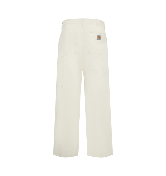Image 2 of 3 - NEUTRAL - Carhartt WIP Double Knee Carpenter Pants are crafted in a heavyweight canvas material in a loose straight fit. Featuring a double-layer knees, zip fly with button closure, front slant pockets, tool pocket, back patch pockets and hammer loop. Material: 100% Organic Cotton 'Dearborn' Canvas, 12 oz. Made in Tunisia. 