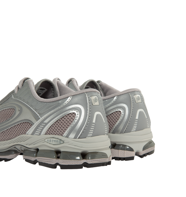 Image 3 of 5 - GREY - New Balance Unisex 1890A Sneakers are crafted with a synthetic upper and feature a progressive apron upper construction that lends a refined, elevated aesthetic to the silhouette. Designed for comfortable everyday wear, the sneaker is equipped with ABZORB midsole cushioning, which absorbs impact through a combination of cushioning and compression resistance, while ABZORB SBS heel cushioning delivers enhanced stability and comfort. An ultra-stable heel further supports all-day wear, bal 