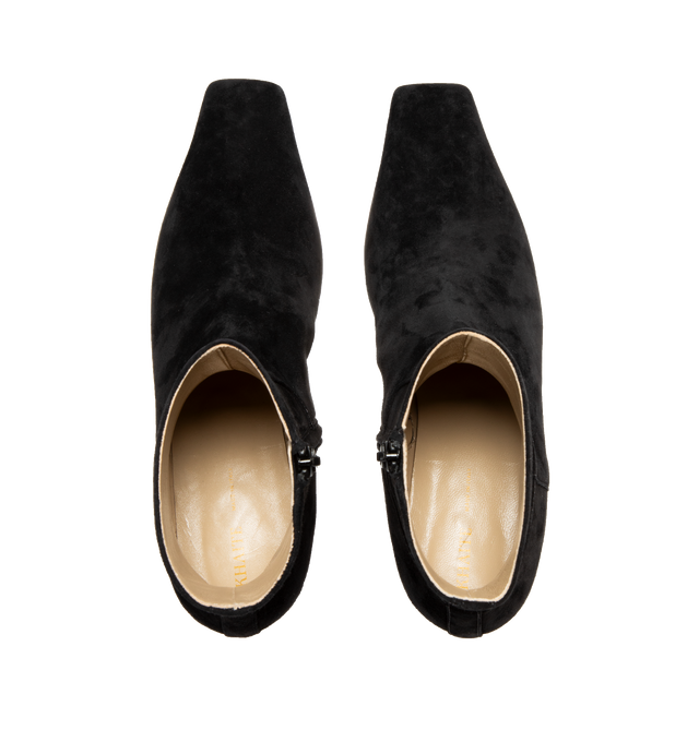 Image 4 of 4 - BLACK - KHAITE Marfa Ankle Boot featuring a square-toed boot crafted in Italy of velvety suede and refined by tonal topstitching. With low, inset heel and side zipper. 2.5 cm heel. 100% calfskin. 