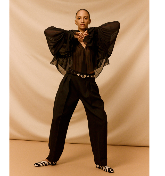 Image 2 of 5 - BLACK - KHAITE Jane Flat in Zebra Haircalf featuring a slipper-like flat, a flexible, cushioned insole for cloud-like comfort and signature gold staple detail at rounded vamp. Zebra print haircalf - 100% calfskin. Made in Italy. 