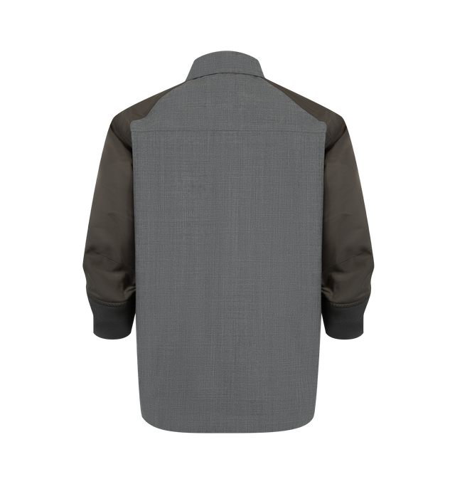 Image 2 of 3 - GREY - Sacai Womens Suiting x Nylon Twill Shirt is crafted from wool with contrasting nylon twill paneling. Features a button-front closure, point collar, long sleeves with button cuffs, and a hybrid tailored construction. Main Material: 100% Wool; Contrast 1: 100% Nylon; Contrast 2: 55% Polyester, 44% Wool, 1% Polyurethane; Lining: 100% Cupro. Made in Japan. 