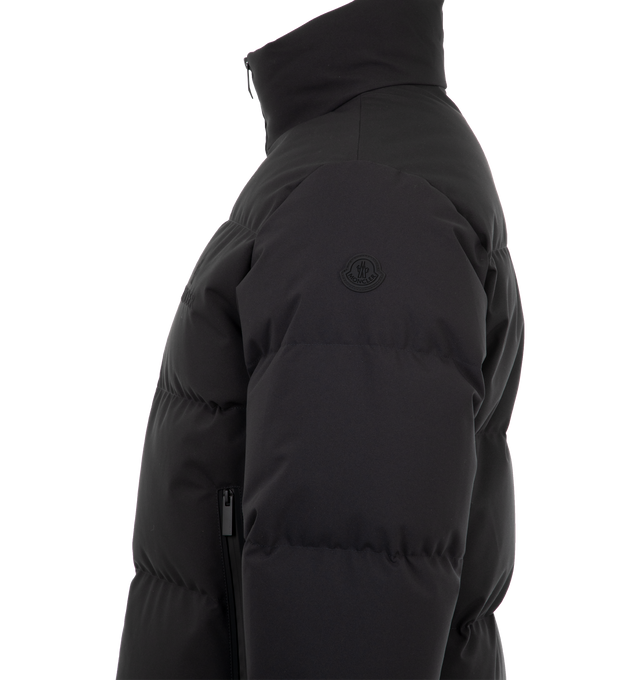 Image 3 of 3 - GREY - MONCLER Misonet Puffer Jacket featuring logo embossed and embroidered chest, stand collar, two-way zip front, long sleeves and side zip pockets. Polyester. Fill: down/feather. Made in Romania. 