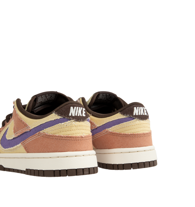 Image 3 of 5 - NEUTRAL - Nike Dunk Low Sneakers with Dusted Clay, Dusty Amethyst and Team Gold color-blocking,  a padded, low-cut collar, leather upper with a slight sheen and durability, foam midsole offering lightweight, responsive cushioning. Perforations on the toe add breathability. Rubber sole with classic hoops pivot circle provides durability and traction. 