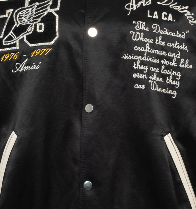 Image 3 of 4 - BLACK - AMIRI Eagle Varsity Bomber Jacket featuring embroidered chest logo, front logo, logo at the back, logo at the back label, side pockets, button fastening, front buttoned closure, long-sleeved and embroidered details. 75% wool, 25% nylon. 