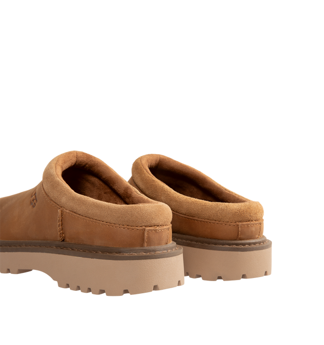 Image 3 of 4 - BROWN - UGG Men's Birch Clog II is crafted from premium suede and features a slip-on clog silhouette with a soft lining and cushioned footbed for exceptional everyday comfort. These designer clogs combine UGG's signature cozy feel with durable construction, making them a versatile choice for both indoor and outdoor wear. Main Material: Suede. Lining: Soft Textile. Sole: Rubber. 