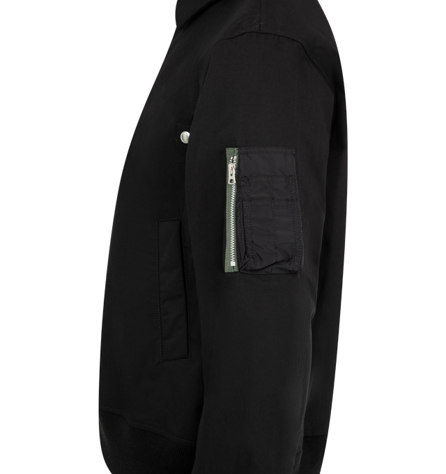 Image 3 of 3 - BLACK - SACAI Rip Stop Blouson Jacket featuring two-way zip closure with press-stud placket, collar, ribbed cuffs and hem, zip pocket on sleeve and side pocket. Made in Japan. 