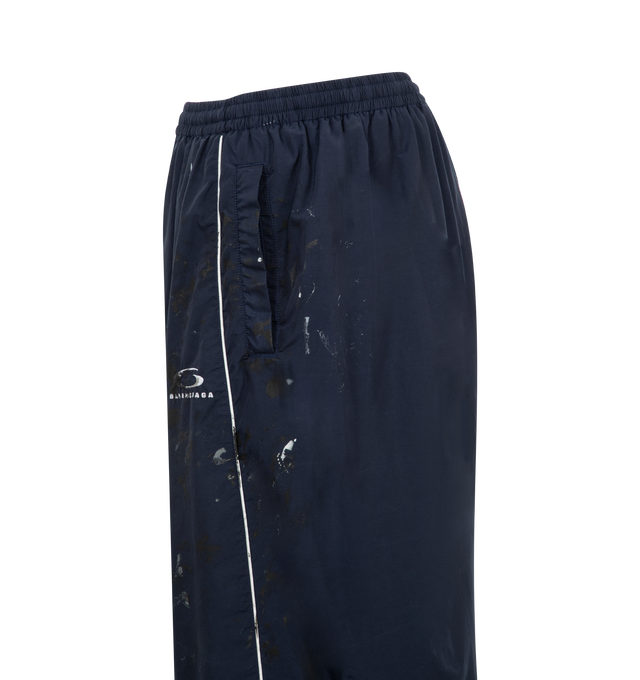 Image 4 of 4 - BLUE - Balenciaga Tracksuit Pants have an elastic waist, side pockets, paint splatters, an embroidered brand logo, and contrast piping. Made in Italy. 