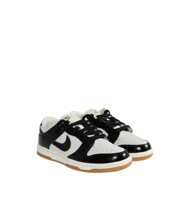 Image 2 of 5 - BLACK - NIKE Dunk Low LX Sneaker featuring lace-up front, signature Swooshes at sides, embossed Air logo at foxing, perforated toe and padded collar with debossed Nike logo at back counter. 