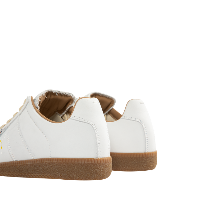 Image 3 of 5 - WHITE - MAISON MARGIELA Paint Replica Sneakers featuring nubuck leather and velour, a paint splatter design, logo label on the tab, white stitching at the back, handmade color treatment, internal Replica label, internal elastic and all-over logo insole. 100% calf leather. Made in Italy 