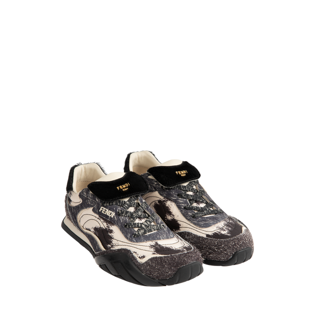 Image 2 of 5 - GREY - FENDI Wave Pulse Sneaker featuring low-top, lace-up closure, technical fabric with a gray graphic print and matching suede inserts, contrasting black cavallino calfskin details, folded tongue, tubular laces, three-dimensional rubber logo on the side, gold-colored metal Fendi logo on the tongue, rubber running sole with wraparound edge on the side and diagonal F motif. 100% calfskin. 100% polyamide. Inside: 100% lamb leather. Made in Italy. 
