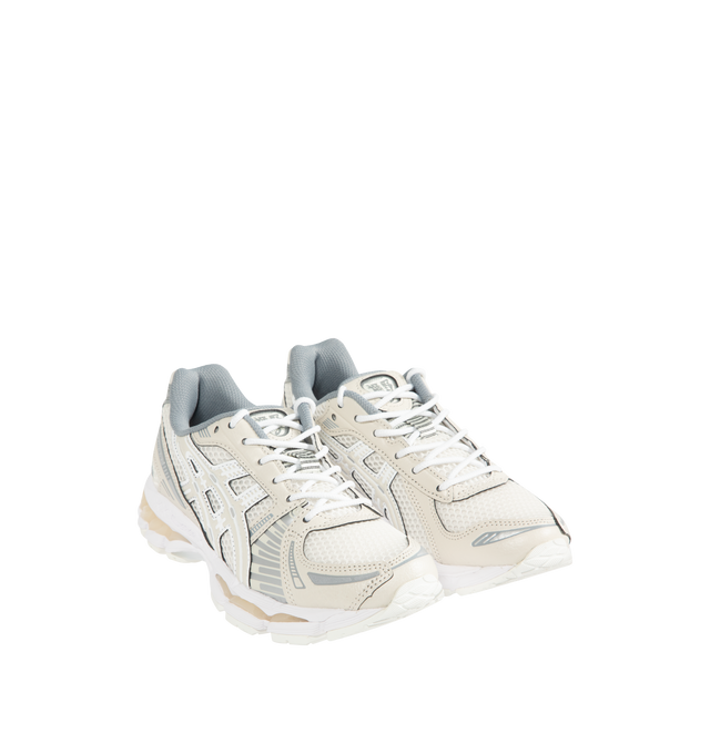 Image 2 of 5 - NEUTRAL - ASICS Gel-Kayano 12.1 Sneaker featuring breathable mesh underlays, GEL-NIMBUS17 tooling system, FLUIDRIDE technology, rearfoot and forefoot GEL technology and dope dyed recycled sockliner mesh. Imported from Vietnam. 