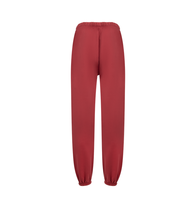 Image 2 of 3 - RED - FEAR OF GOD ESSENTIALS Classic Sweatpant featuring front drawstring tie closure, elasticized waistband, side seam pockets and front printed logo and heavyweight knit fabric with fleece lining. 100% cotton. 