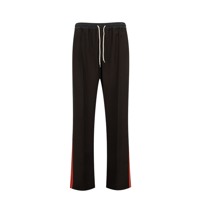 Image 1 of 3 - BROWN - Wales Bonner Men's Energy Trouser is crafted from crespo wool and silk and features a refined tailored silhouette with a concealed drawstring elasticized waistband for elevated comfort. Detailed with front pleats, slip pockets, contrast ribbing along the side legs, and an embroidered WB logo at the back, these trousers balance classic tailoring with the brand's distinctive sportswear influences. Main Material: 100% Virgin Wool. Trim 1: 100% Silk. Trim 2: 100% Polyester. Pocket Lining: 