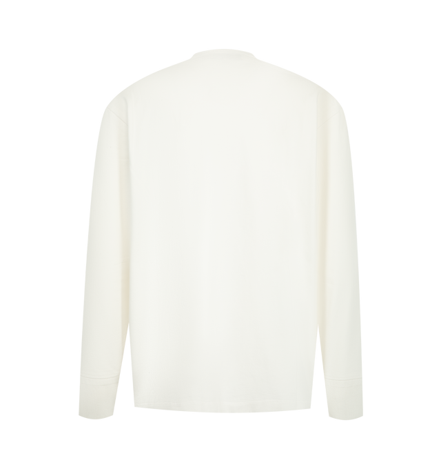 Image 2 of 2 - WHITE - Studio Nicholson Kuyto Long Sleeve Jersey is crafted from soft-touch cotton jersey and features a refined Henley-inspired silhouette designed for effortless layering. An elevated take on a wardrobe staple, it is detailed with a grandad collar, three-button placket, dropped shoulders, and ribbed cuffs, while the specially treated fabric offers a rich peach-like texture and substantial hand feel. Main Material: 100% Cotton. Made in Portugal. 