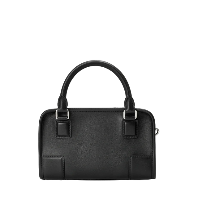 Image 5 of 11 - BLACK - LOEWE Mini Amazona 180 Bag in soft calfskin featuring two carry options: short handle, removable and adjustable crossbody strap, zip closure with two leather zip pullers, two compartments, main compartment closed with magnetic closure, left side d-ring for customization, suede lining, embossed LOEWE and embossed double L branding. Soft calfskin. 11.5 cm x 20 cm x 7 cm. Made in Spain. 
