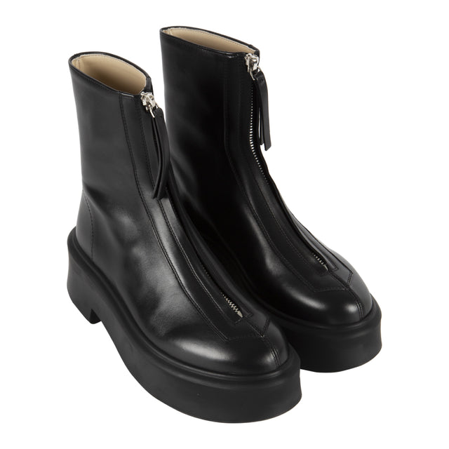 Image 2 of 2 - BLACK - THE ROW Zip Platform Boots have a round toe, topstitch details, front zip, and  2" platform heel. Rubber outsoles. Lined. 100% leather. Made in Italy. 