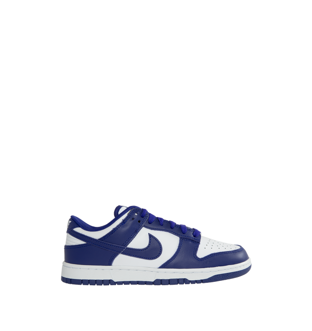 Image 1 of 5 - PURPLE - Nike Dunk Low Sneakers with white and concord purple color-blocking,  a padded, low-cut collar, leather upper with a slight sheen and durability, foam midsole offering lightweight, responsive cushioning. Perforations on the toe add breathability. Rubber sole with classic hoops pivot circle provides durability and traction.  