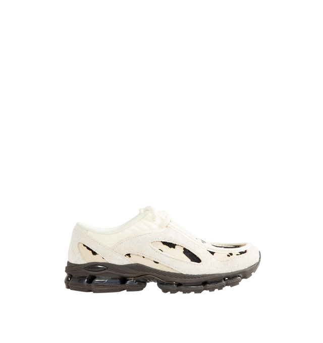 Image 1 of 5 - CREAM - New Balance 1890A Sneakers feature a progressive silhouette that combines everyday comfort with an elevated, formal-inspired design. Crafted with a premium leather apron upper, this versatile style is equipped with ABZORB midsole cushioning for superior impact absorption and ABZORB SBS heel cushioning for enhanced stability and comfort. Finished with an ultra-stable heel construction, the 1890A seamlessly blends performance heritage with refined styling. Main Material: Leather Upper.  
