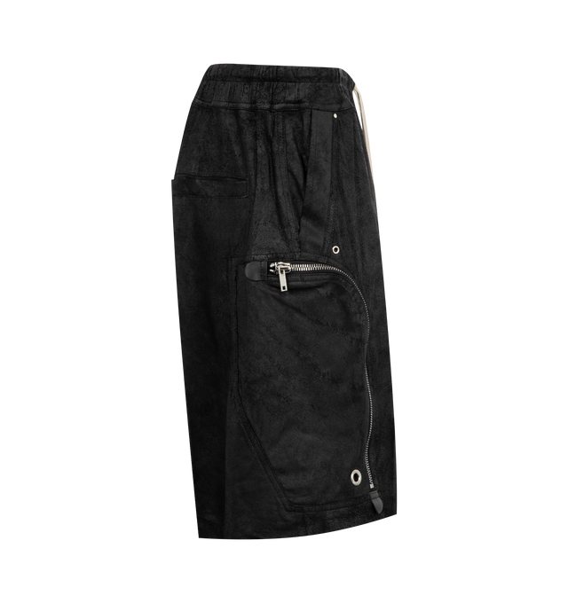 Image 3 of 3 - BLACK - Rick Owens Bahaus Bela shorts crafted from black blister lamb leather. Knee-length style featuring an elasticized waistband with drawstring, low crotch, exposed center zipper with 2 snap detail at the bottom, side welt pockets with eyelet and rivet detail, and Bahaus zippered pockets with large eyelets. 100% lighweight lamb leather with an uneven, blistered texture made in Italy. Pockets- cow leather. Lining- cotton.  