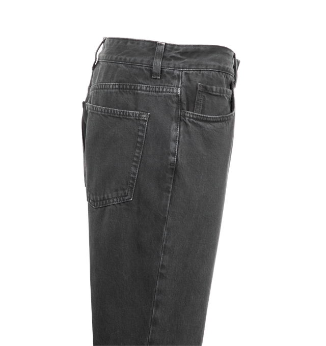 Image 3 of 3 - BLACK - THE ROW Lyndsey Dark Wash Jeans featuring five pockets, zip fly, belt loops, low rise, regular fit and flared leg. 100% cotton. Made in Italy. 