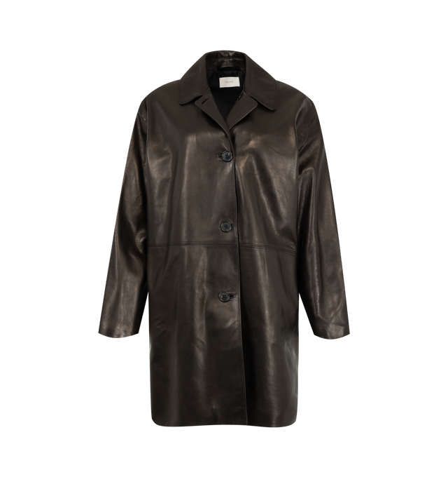 Image 1 of 3 - BLACK - The Row Women's Donata Coat is crafted from tumbled baby calfskin leather and features a mid-length car coat silhouette with a flat collar, dropped shoulders, side seam pockets, and a horn button-front closure. Fully lined in silk, this designer leather coat combines exceptional Italian craftsmanship with an exceptionally soft hand and rich natural texture, creating a timeless outerwear staple with effortless sophistication. Main Material: 100% Calfskin Leather. Lining: 100% Silk. Mad 