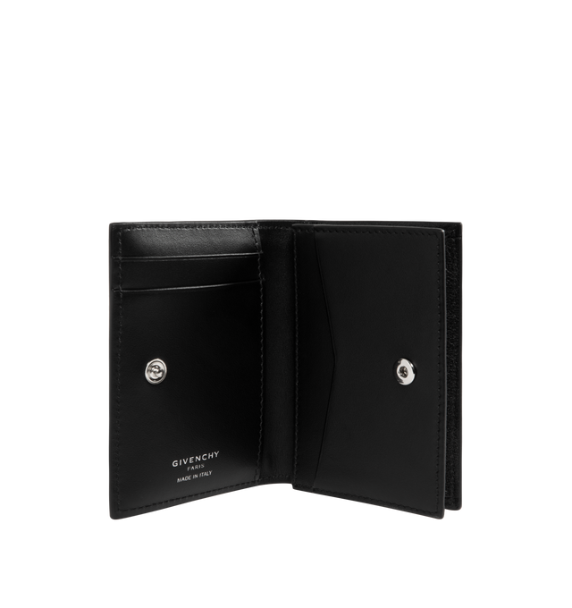 Image 3 of 3 - BLACK - GIVENCHY Snap Closure Card Holder featuring flap card holder in padded calfskin leather, press-stud closure, silvery Givenchy Paris signature on the inside, one compartment for bills and coins and three card slots. 4.3 in x 2.8 in x 0.8 in. 100% calfskin leather. 