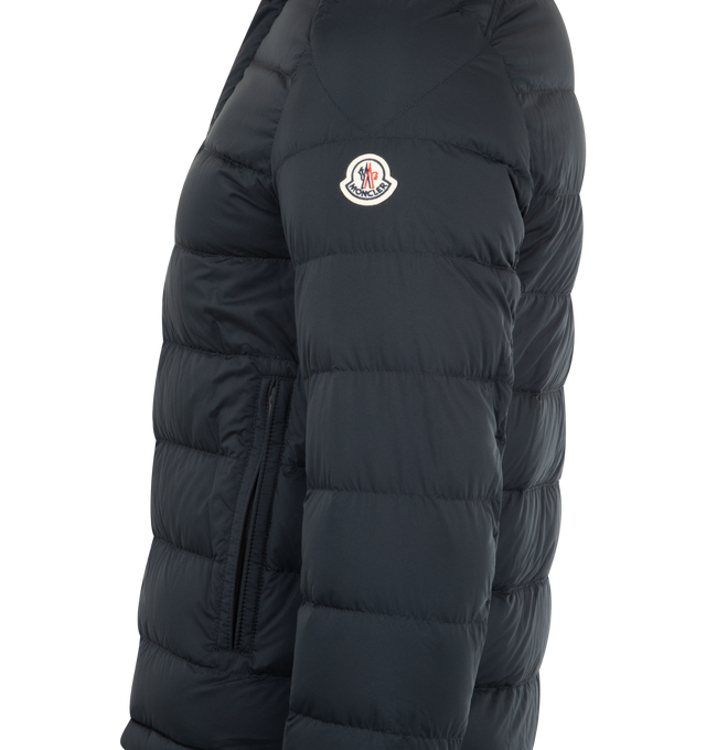 Image 3 of 4 - NAVY - MONCLER Selves Short Down Jacket featuring water-repellent main fabric, longue saison lining, down-filled, zipper and snap button closure, zipped pockets, adjustable cuffs and hem with drawstring fastening. 100% polyamide/nylon. 90% down, 10% feather.  
