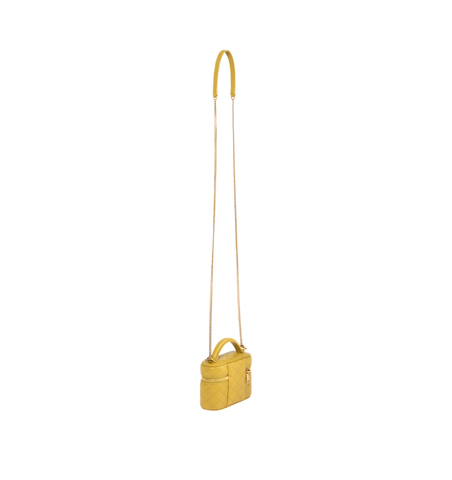 Image 2 of 3 - YELLOW - SAINT LAUREN Micro Gaby Vanity Bag sized to fit small items such as AirPods, keys, lipstick, and cards. Decorated with the CASSANDRE and diamond-quilted overstitching. Crafted from Lambskin and fully lined in leather, featuring a detachable chain strap for multiple carry options, bronze-toned hardware, zip closure, one card slot. Measures 4.7" x 3.1" x 1.6" with 1.8" handle drop and 21.7" strap drop. Lambskin. Made in Italy 