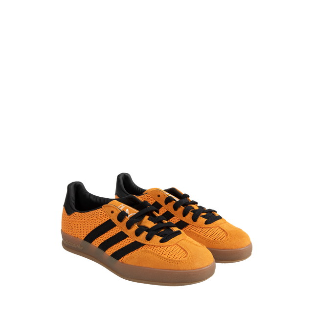 Image 2 of 5 - ORANGE - ADIDAS Gazelle lace-up soccer-inspired adidas shoes made with premium materials. Crafted with a breathable cotton mesh upper with suede overlays, classic T-toe, 3-Stripes and gum rubber outsole. Unisex style in mens sizing. 